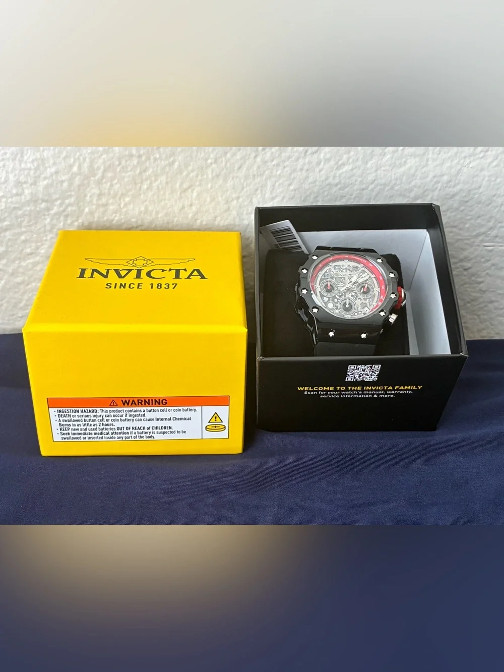 Invicta Black and Red Skeleton Dial Chronograph Watch
